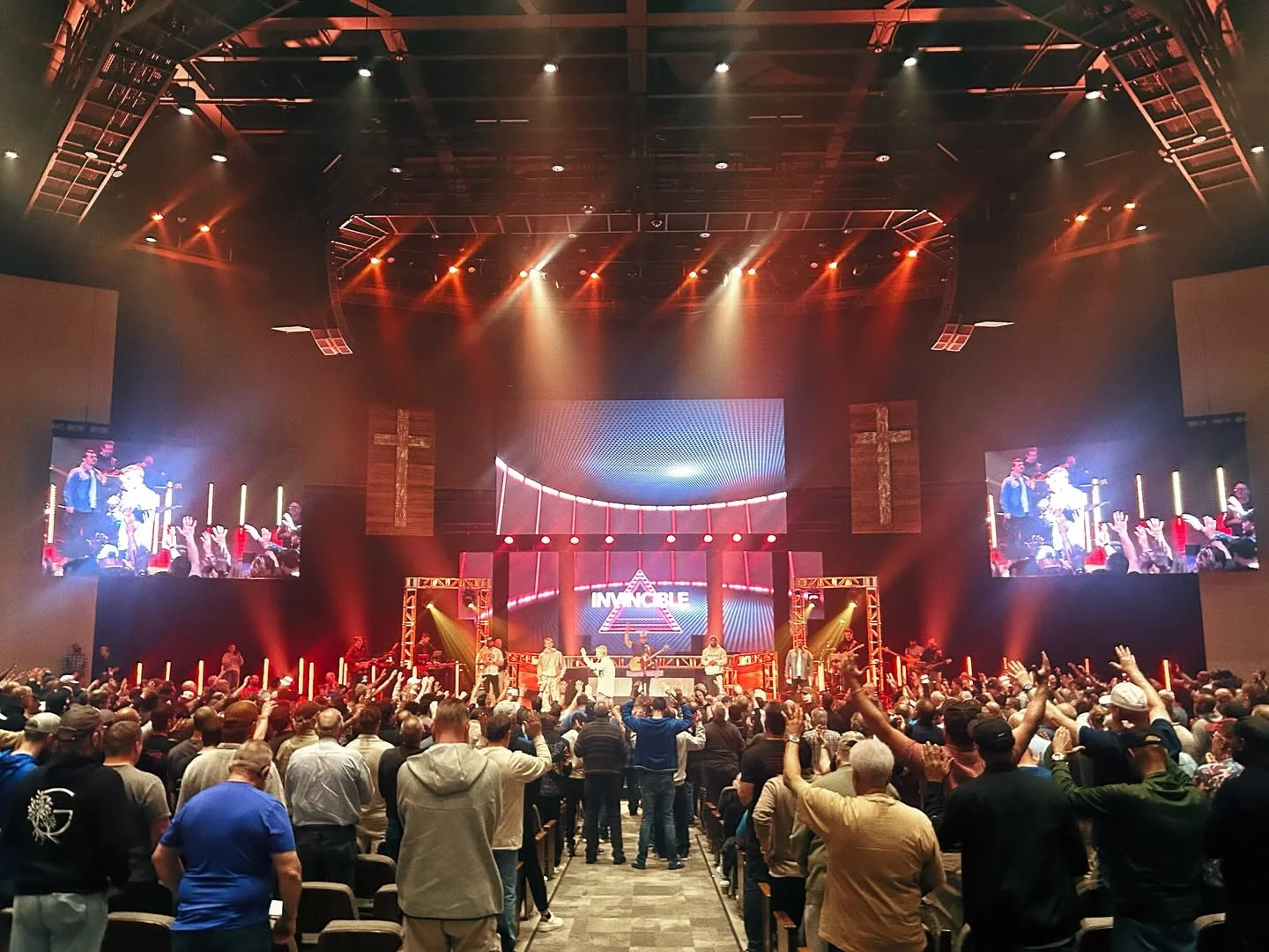 The Brightmoor auditorium filled with men worshipping together at Invincible 2026
